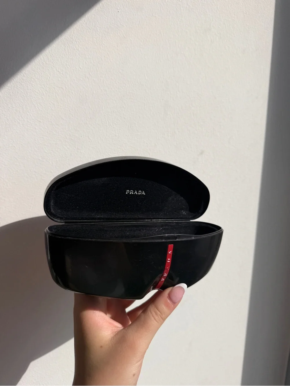 Prada Black Cat-Eye Sunglasses with Gradient Lenses